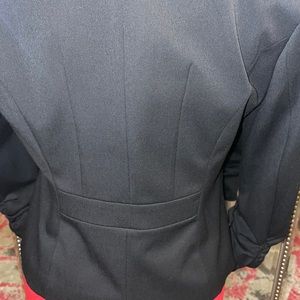 Express suit coat lined with quarter sleeves
